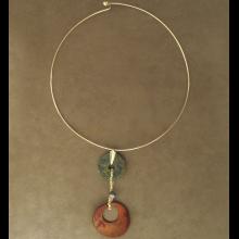 Collier avec pice en bronze